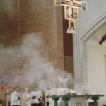 Click here for tour.The Prince of Peace Church, designed by Ron Geyer of Craig, Gaulden & Davis, was dedicated on September 21, 2003. The church, located in Taylors, South Carolina, has a nave 120 feet long and 70 feet high with seating for 1,200. The artistic program, designed by Pietro Designs, includes the limestone and marble altars, font and tabernacle bases. Other furnishings designed by Pietro include the black walnut and marble presider's chair, the black walnut deacons' chairs and lecterns, the black walnut and granite credence tables, the baptistery grille and the dedication sconces.