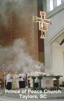 Click here for tour.The Prince of Peace Church, designed by Ron Geyer of Craig, Gaulden & Davis, was dedicated on September 21, 2003. The church, located in Taylors, South Carolina, has a nave 120 feet long and 70 feet high with seating for 1,200. The artistic program, designed by Pietro Designs, includes the limestone and marble altars, font and tabernacle bases. Other furnishings designed by Pietro include the black walnut and marble presider's chair, the black walnut deacons' chairs and lecterns, the black walnut and granite credence tables, the baptistery grille and the dedication sconces.